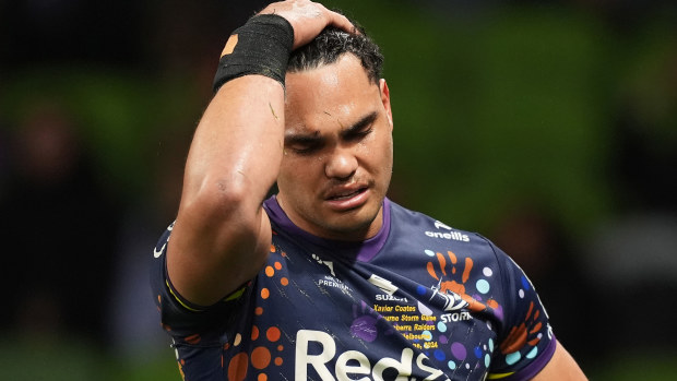 Xavier Coates of the Storm leaves the field with an injury during the round 17 NRL match between Melbourne Storm and Canberra Raiders at AAMI Park, on June 29, 2024, in Melbourne, Australia. (Photo by Daniel Pockett/Getty Images)