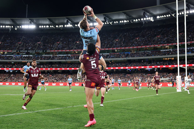 Zac Lomax of the Blues catches a high ball to score a try during game two of the men's State of Origin series between New South Wales Blues and Queensland Maroons at the Melbourne Cricket Ground on June 26, 2024 in Melbourne, Australia. (Photo by Cameron Spencer/Getty Images)