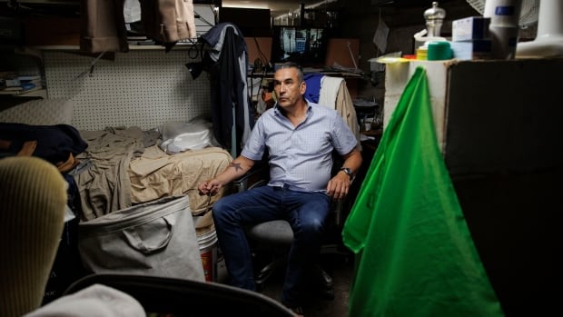 Why this landlord is living in his restaurant basement