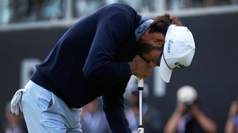 Akshay Bhatia reacts to missing a par putt on the 18th green during the final round of the Rocket Mortgage Classic golf tournament at Detroit Country Club, Sunday, June 30, 2024, in Detroit. (AP Photo/Paul Sancya)