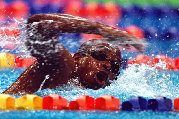 Eric Moussambani struggling down the pool.