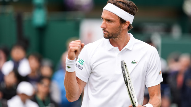 Arthur Rinderknech of France reacts in the Men's Singles Second Round match against Kei Nishikori of Japan during day three of The Championships Wimbledon 2024 at All England Lawn Tennis and Croquet Club on July 03, 2024 in London, England. (Photo by Shi Tang/Getty Images)