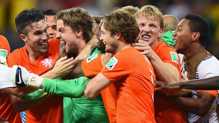 SALVADOR, BRAZIL - JULY 05:  Goalkeeper Tim Krul of the Netherlands celebrates with teammates after making a save in a penalty shootout to defeat Costa Ric