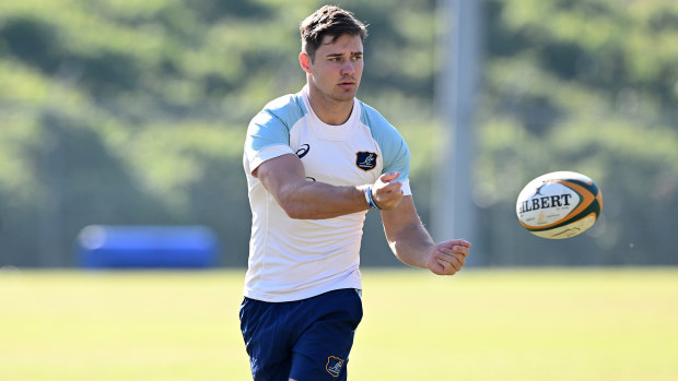 Josh Flook passes the ball during a Wallabies training session at Ballymore Stadium.