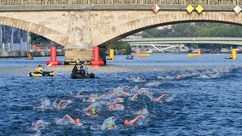 Athletes swim in the Seine River during a test event on Aug. 17, 2023 for the women's Olympic triathlon in August 2024 in Paris, France.