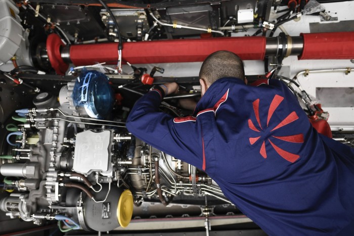 A Leonardo employee making a helicopter