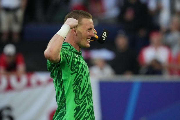 Jordan Pickford of England celebrates the win during the UEFA EURO 2024 quarter-final match between England and Switzerland at Düsseldorf Arena on July 06, 2024 in Dusseldorf, Germany. (Photo by Kaz Photography/Getty Images)