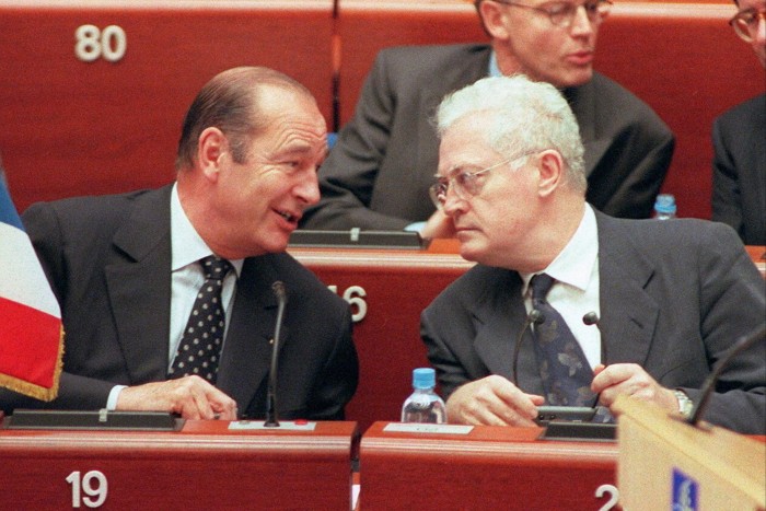 President Jacques Chirac, left, talks to his Prime Minister Lionel Jospin during the Council of Europe summit in Strasbourg, October 11, 1997