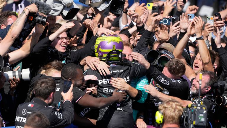 Mercedes driver Lewis Hamilton of Britain celebrates after winning the British Formula One Grand Prix race at the Silverstone racetrack, Silverstone, England, Sunday, July 7, 2024. (AP Photo/Luca Bruno)