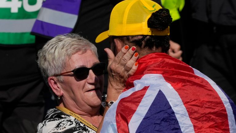 Mercedes driver Lewis Hamilton of Britain celebrates with his mother after winning the British Formula One Grand Prix race at the Silverstone racetrack, Silverstone, England, Sunday, July 7, 2024. (AP Photo/Luca Bruno)