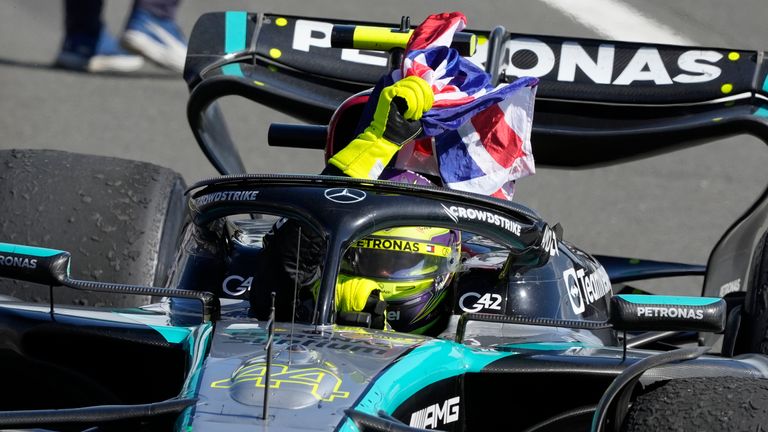 Mercedes driver Lewis Hamilton of Britain celebrates after winning the British Formula One Grand Prix race at the Silverstone racetrack, Silverstone, England, Sunday, July 7, 2024. (AP Photo/Luca Bruno)