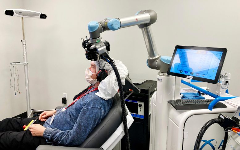 Robotic Arm Holds TMS Coil Brain Stimulation