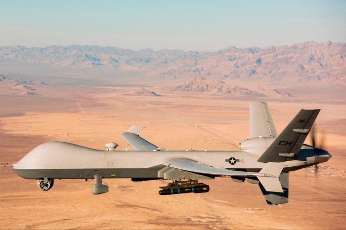 An MQ-9 Reaper drone flies over a testing range in Nevada