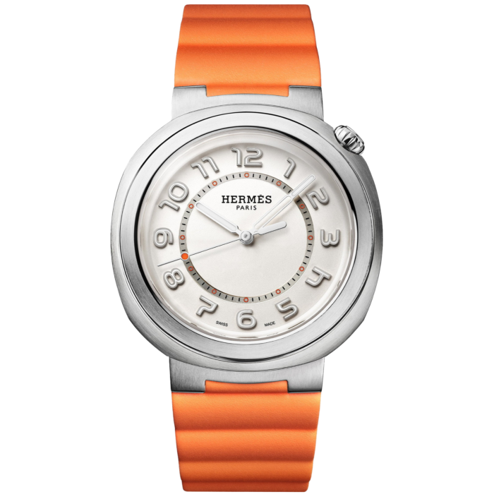 A watch with a metal round case, silver dial, and thick orange strap