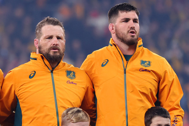 James Slipper and Liam Wright of the Wallabies sing the national anthem.