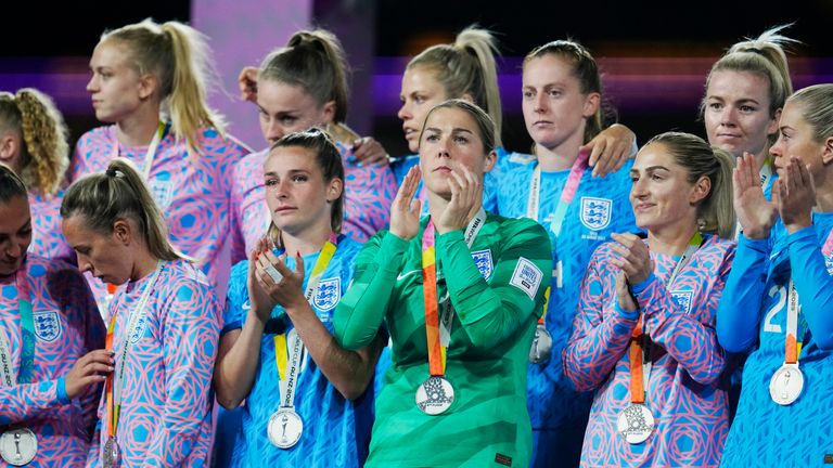 England players pose with their second place medals at the end of the Women's World Cup soccer final between Spain and England at Stadium Australia in Sydney, Australia, Sunday, Aug. 20, 2023. Spain won 1-0. (AP Photo/Abbie Parr)