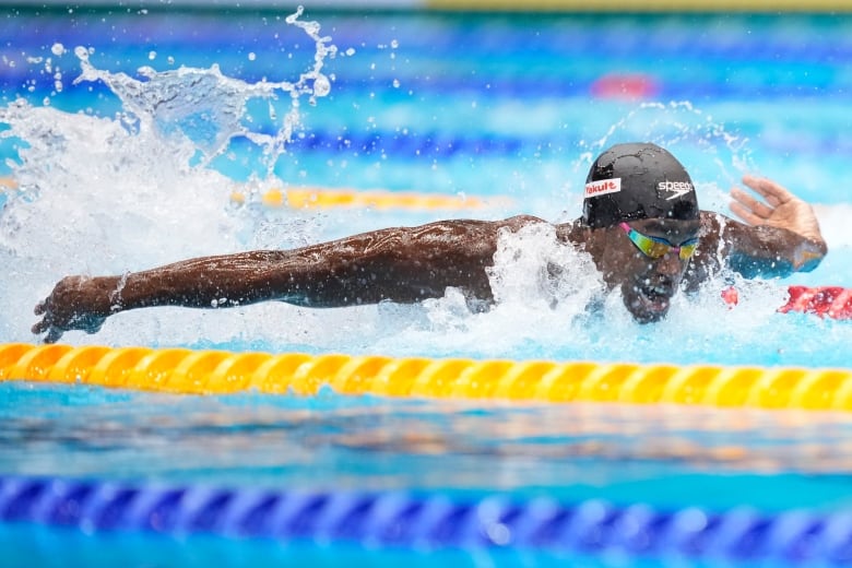 Canadian male swimmer competes during the men's 100m butterly semifinal at the World Swimming Championships in Fukuoka, Japan, Friday, July 28, 2023. 