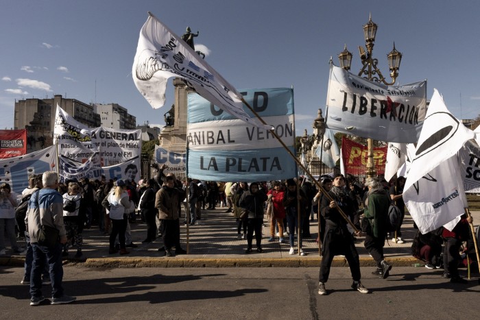 Demonstrators protest outside the National Congress during the Chamber of Deputies vote on the omnibus bill in Buenos Aires