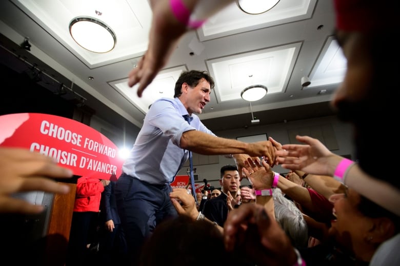 Liberal Leader Justin Trudeau headed Wednesday to what he calls his "second home" in British Columbia, headlining a boisterous evening rally in the riding of Vancouver Kingsway -- right next door to the constituency held by his former attorney general, Jody Wilson-Raybould.