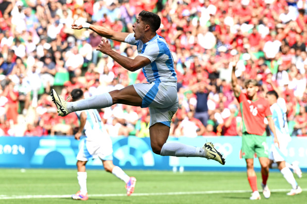 Giuliano Simeone of Argentina celebrates scoring.