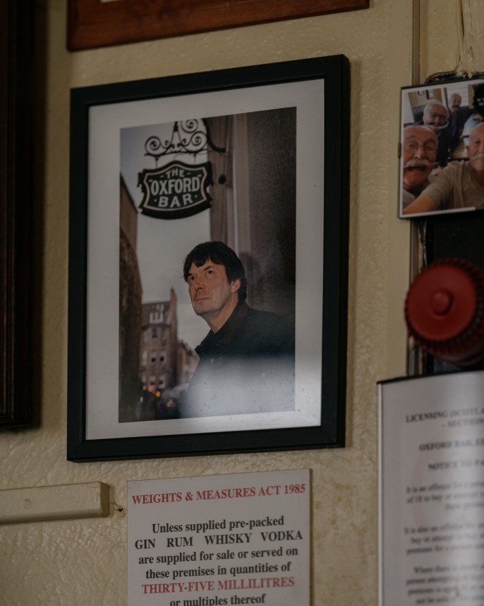 A framed photo of the writer Sir Ian Rankin on the wall of The ‘Oxford’