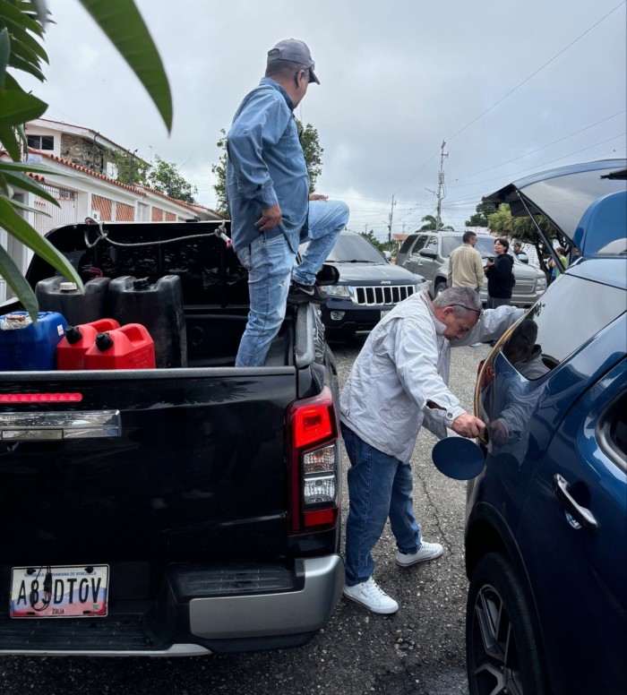 A refuelling stop at a supporter’s house in Barquisimeto during Machado’s road trip