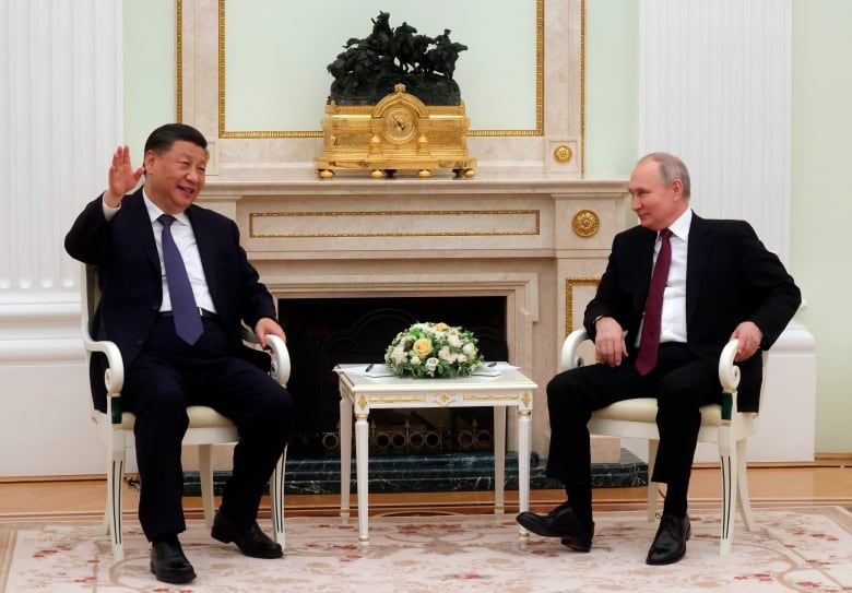 Chinese President Xi Jinping, left, gestures while speaking to Russian President Vladimir Putin during their meeting at the Kremlin in Moscow, Russia on March 20, 2023.