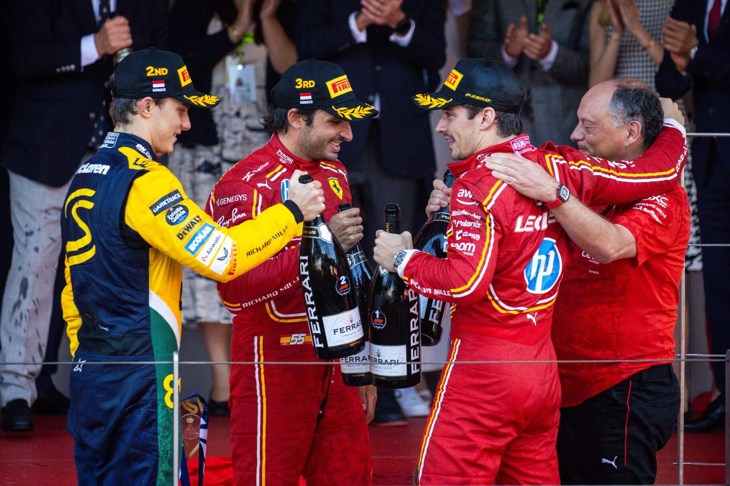 MONTE-CARLO, MONACO - MAY 26: Charles Leclerc of Monaco and Ferrari, Oscar Piastri of Australia and McLaren, Carlos Sainz of Spain and Ferrari and Ferrari team principal Fred Vasseu celebrate on the podium after the F1 Grand Prix of Monaco at Circuit de Monaco on May 26, 2024 in Monte-Carlo, Monaco. (Photo by Jayce Illman/Getty Images)