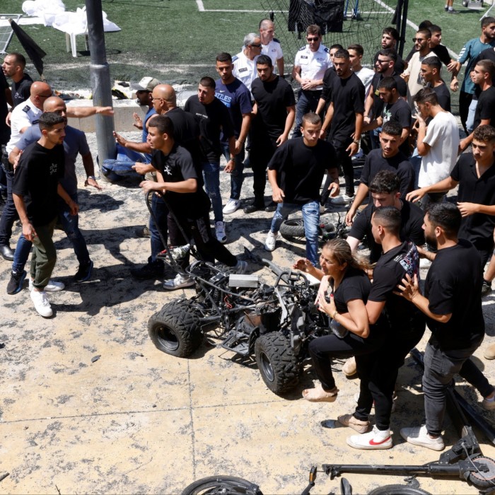 Protesters gather during the visit by Israel’s Prime Minister Benjamin Netanyahu