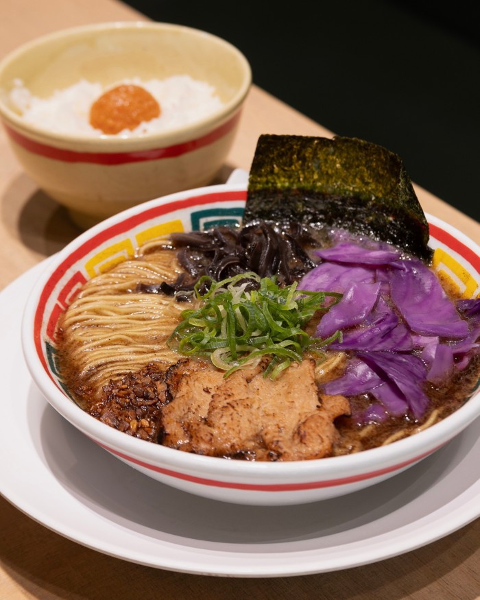 A bowl of plant-based ramen and a smaller bowl of rice at Vegan Bistro Jangara