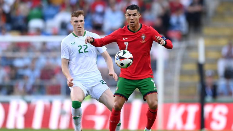 Aveiro , Portugal - 11 June 2024; Cristiano Ronaldo of Portugal in action against Jake O'Brien of Republic of Ireland during the international friendly match between Portugal and Republic of Ireland at Est..dio Municipal de Aveiro in Aveiro, Portugal. (Photo By Stephen McCarthy/Sportsfile via Getty Images)