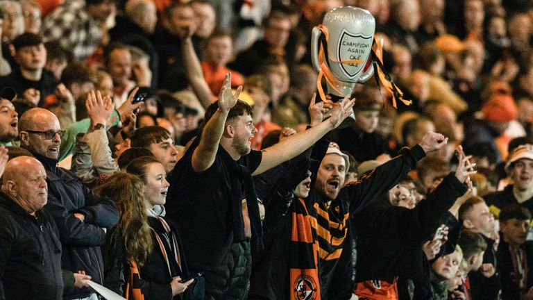 Dundee United fans celebrate promotion to the Scottish Premiership