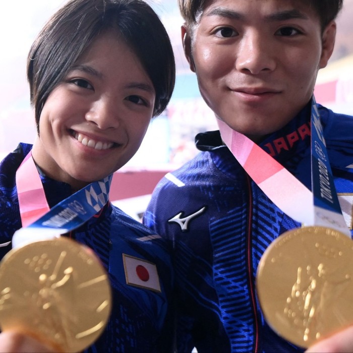 Hifumi Abe, right, and his sister Uta with their gold medals