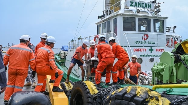 Oil starting to leak from Philippine tanker that sank in Manila Bay, coast guard says