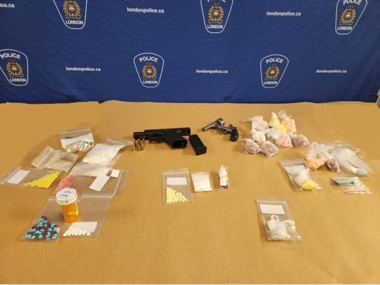 An image of a drugs and firearms seizure from January, 2023 in which London police seized 341 Dilaudid pills, among other items. 