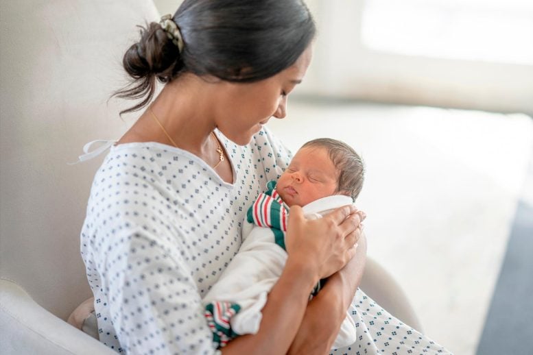 Mother Holding Newborn Baby