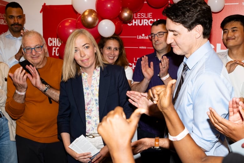 Toronto—St Paul's residents will head to the polls today to vote for a new member of parliament to represent their riding, which the Liberals have won in the last 10 elections. Liberal Party candidate Leslie Church, third from left, and Liberal Leader Justin Trudeau speak to supporters at a campaign volunteer event, in Toronto on Thursday, May 30, 2024.