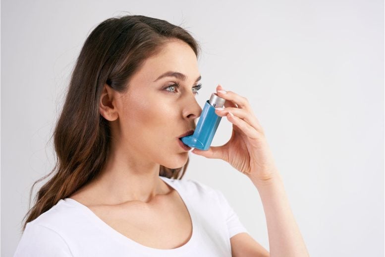 Woman Asthma Inhaler