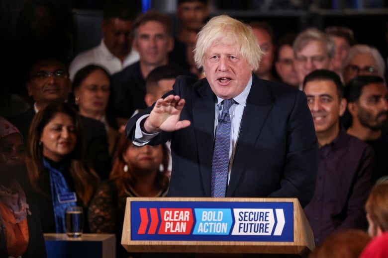 Former British Prime Minister Boris Johnson gestures as he endorses British Prime Minister Rishi Sunak at a campaign event during a Conservative general election campaign event in London, Britain, July 2, 2024. 