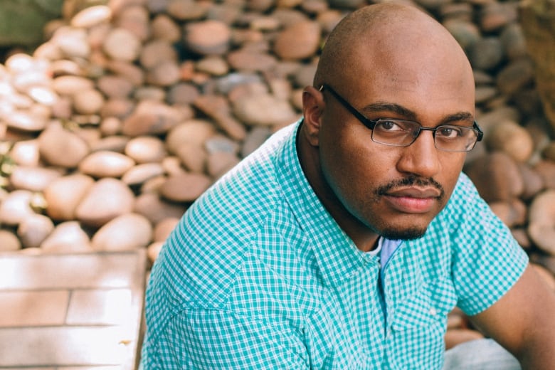 A headshot of a man. 