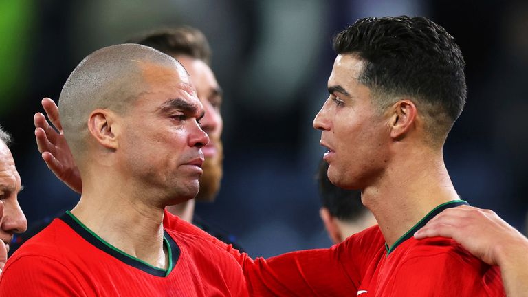 05 July 2024, Hamburg: Soccer, UEFA Euro 2024, European Championship, Portugal - France, final round, quarter-final, Volksparkstadion, Portugal's Pepe (l) is comforted by his team-mate Cristiano Ronaldo after the penalty shoot-out. Photo by: Jens B'ttner/picture-alliance/dpa/AP Images