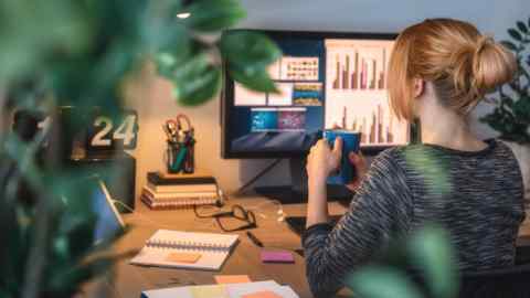 A woman at her computer working from home