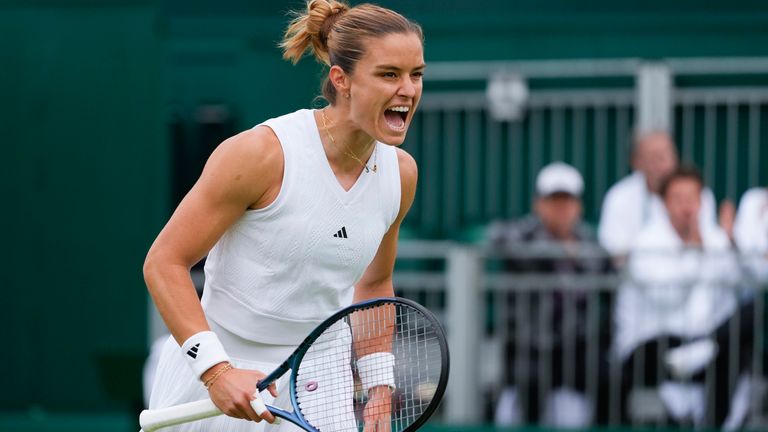 Maria Sakkari of Greece reacts after winning point against Arantxa Rus of the Netherlands during their match on day three at the Wimbledon tennis championships in London, Wednesday, July 3, 2024. (AP Photo/Kirsty Wigglesworth)