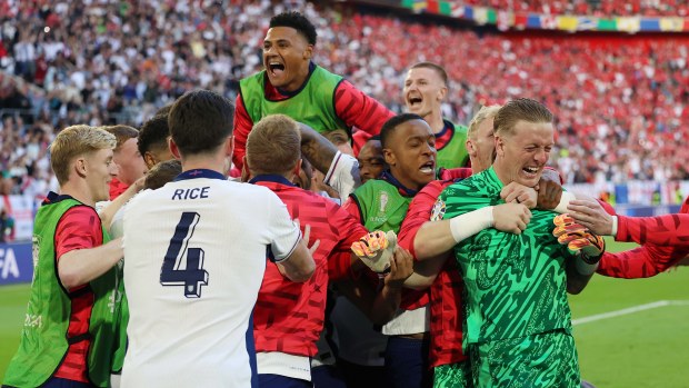 England players celebrate the penalty shoot out victory during the UEFA EURO 2024 quarter-final match between England and Switzerland at Dusseldorf Arena on July 6, 2024 in Dusseldorf, Germany. (Photo by Crystal Pix/MB Media/Getty Images)