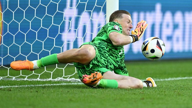 Jordan Pickford saves Manuel Akanji's penalty