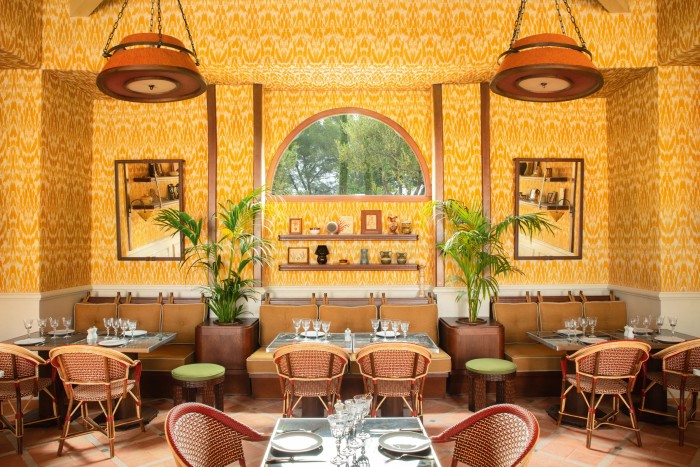 The renovated interior of the poolside restaurant at Le Mas Candille, Mougins