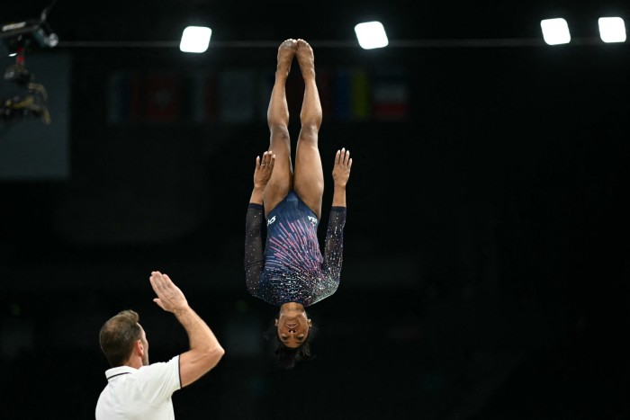 Biles upside-down in mid-air