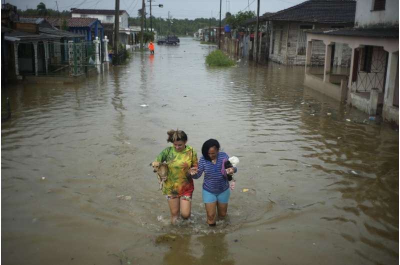 Humans caused climate change. Amid the suffering, now they must solve it