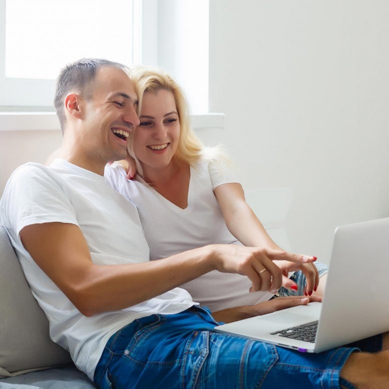 Couple Laughing Computer