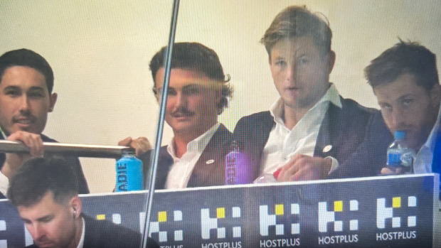 Nick Meaney, Jonah Pezet, Harry Grant and Cameron Munster caught on camera in Melbourne Storm's coach's box.